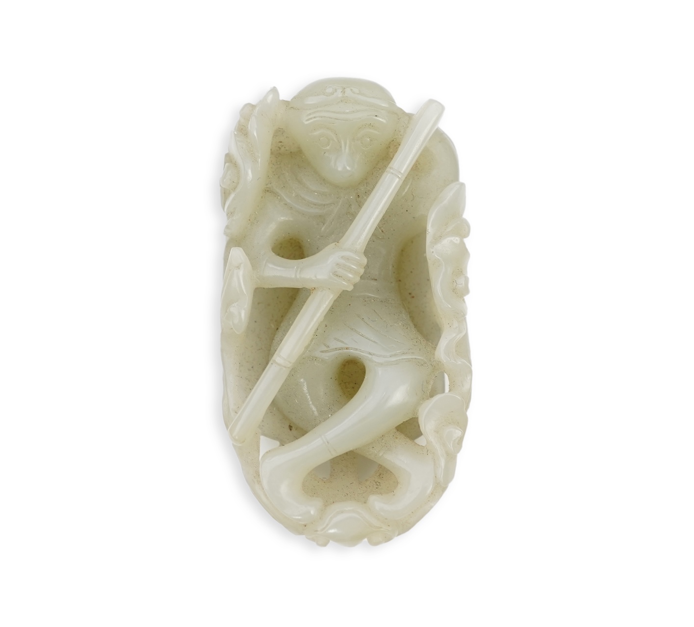 A Chinese pale celadon jade carving of Sun Wukong, the Monkey King, 18th/19th century